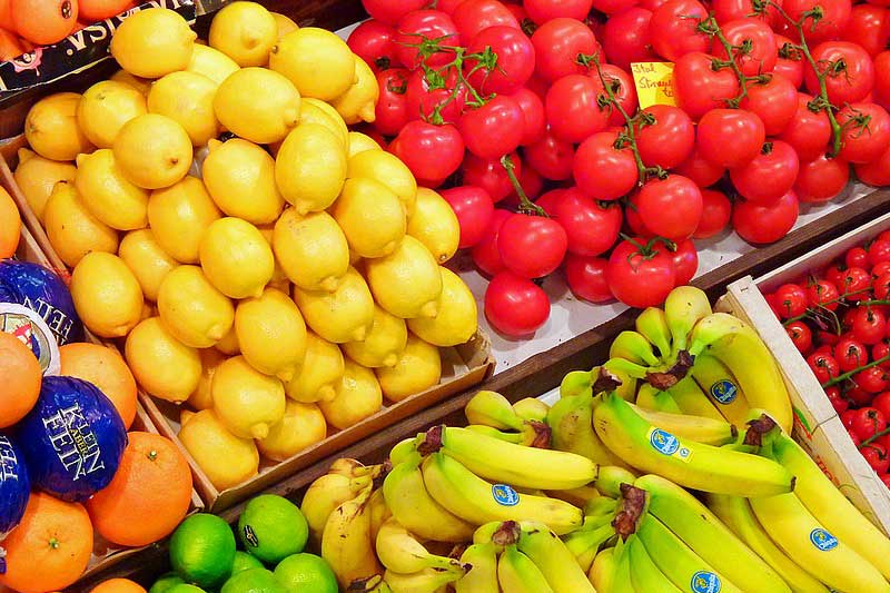 Photo of fruit and vegetable stand.