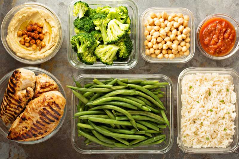 Photo of ingredients in separate bowls for meal prep.