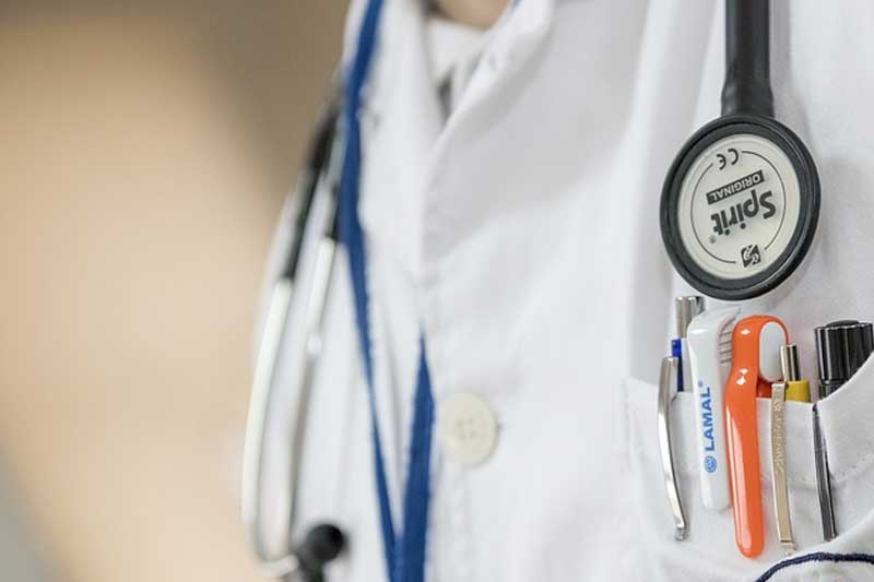 Close up photo of medical personnel.