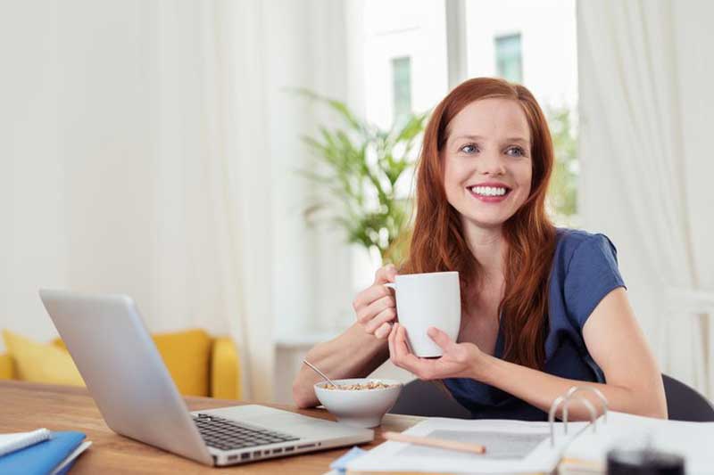 Photo of young woman who is her own boss.