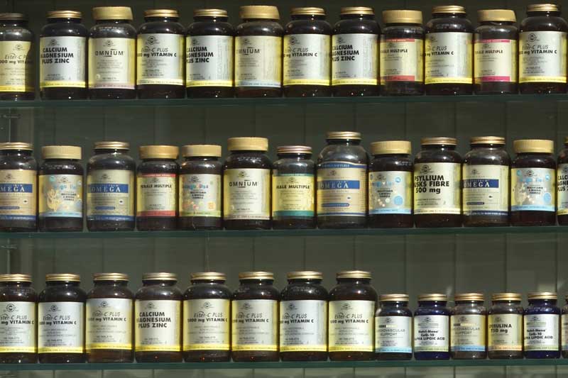 Photo of bottles of vitamins in a store.